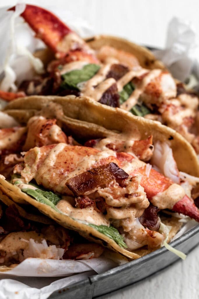 Leftover lobster recipes: lobster and bacon tacos with avocado.