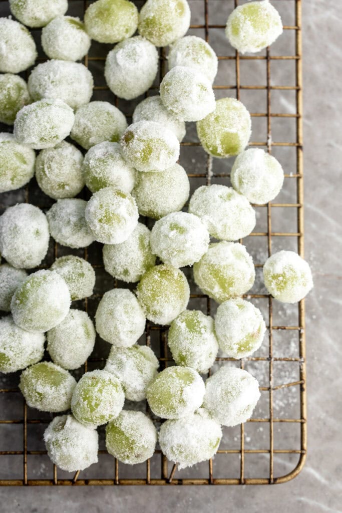 candied grapes on wire baking rack.