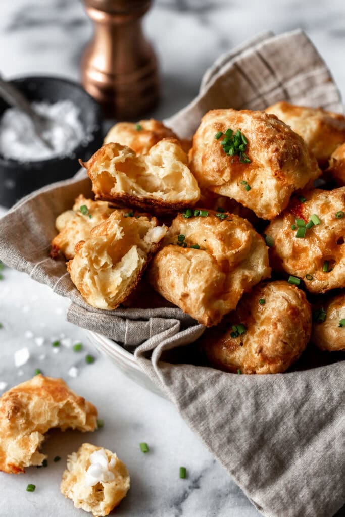 Leftover lobster recipes: cheddar and lobster gougeres garnished with chives.