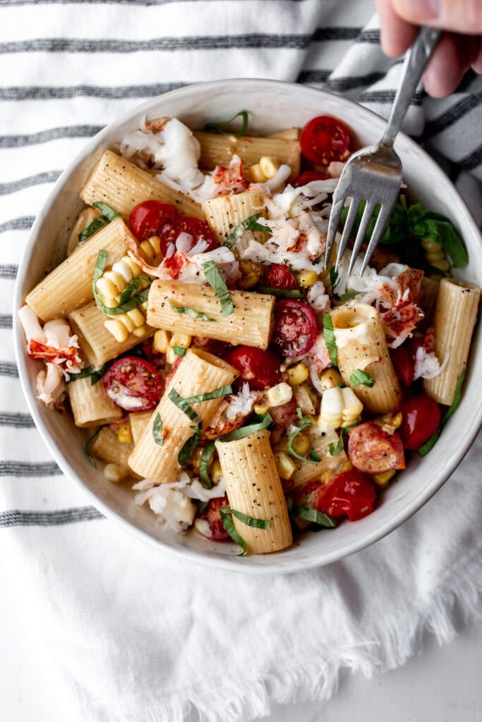 Leftover lobster recipes: corn rigatoni and lobster with chopped basil.