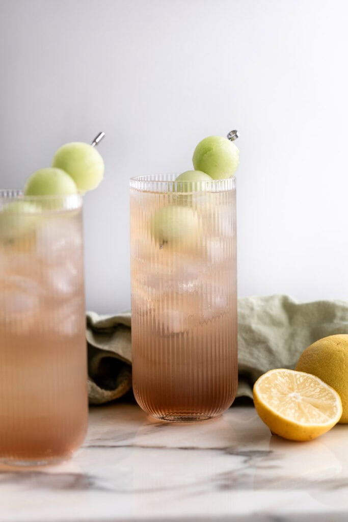 mixed ingredients of honey deuce cocktail with ice.