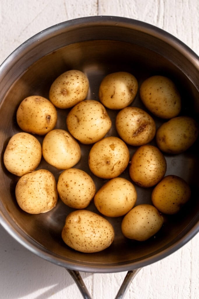 boiled potatoes in saucepot.