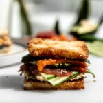 erewhon copycat crispy rice sushi sandwich with layered cucumber, tuna, salmon and crab.
