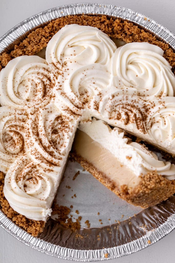 maple cream pie with slice cut.