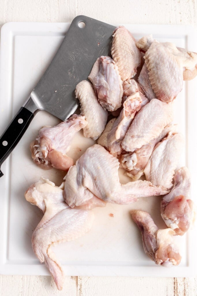 chicken wings separated with meat cleaver.