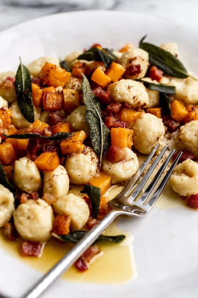 Cooking with Cocktail Rings Blogger Kylie Mazon-Chambers Fall Entrée Ideas shares Fall Entrée Ideas: Fall Gnocchi with Butternut Squash, Brown Butter, Pancetta and Sage