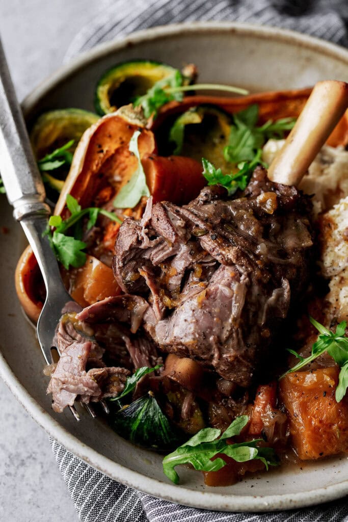 braised lamb shanks over butternut squash.