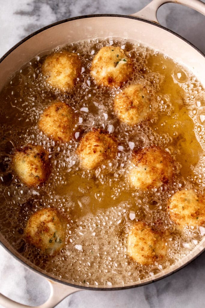 fried croquettes in oil.