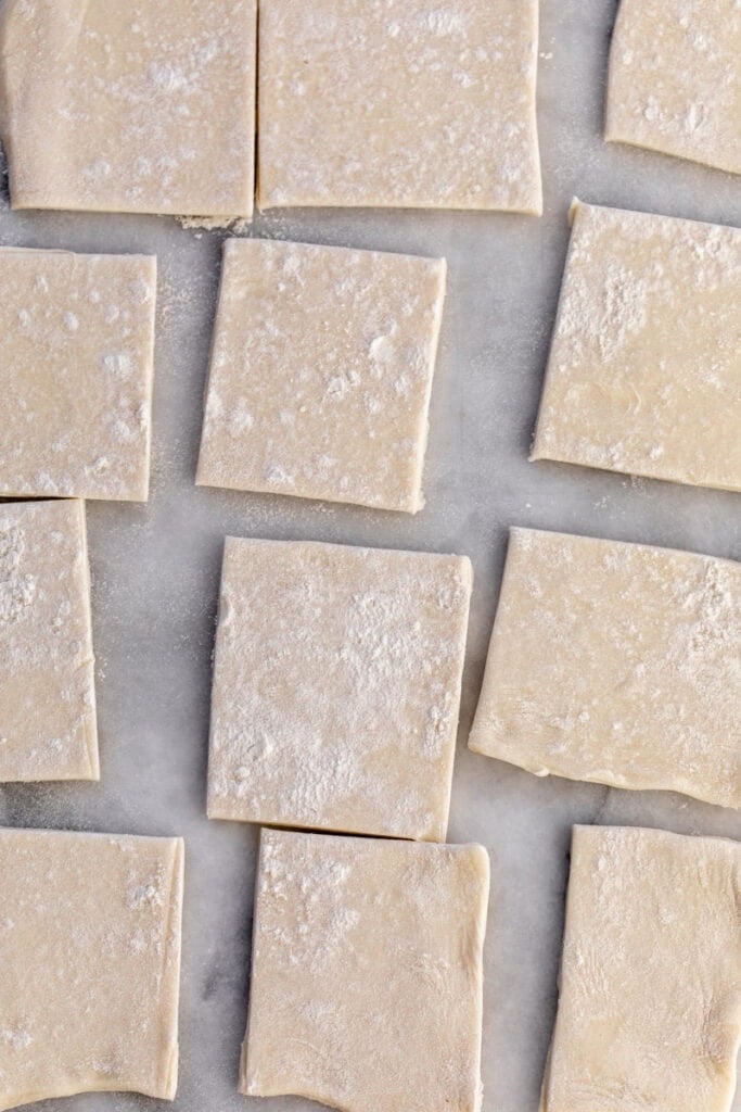 cut squares of puff pastry.