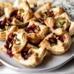 raspberry vaked brie puff pastry bites.