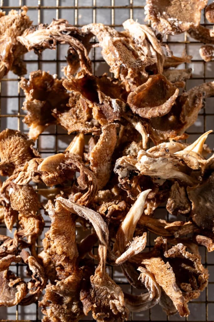 crispy fried oyster musshrooms on cooling rack.