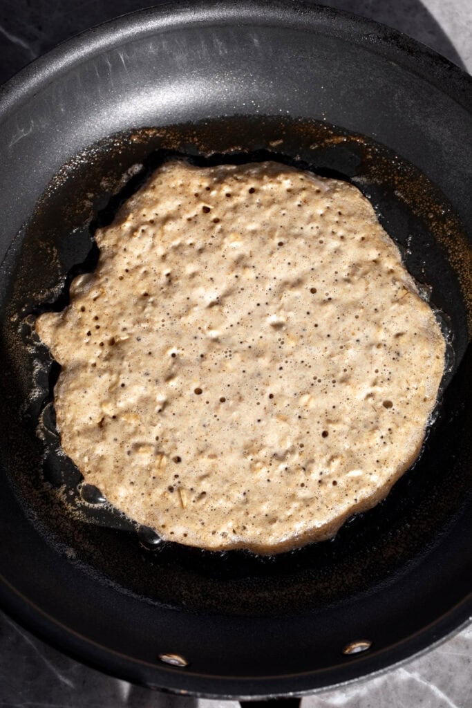 cooked griddle cake in pan.