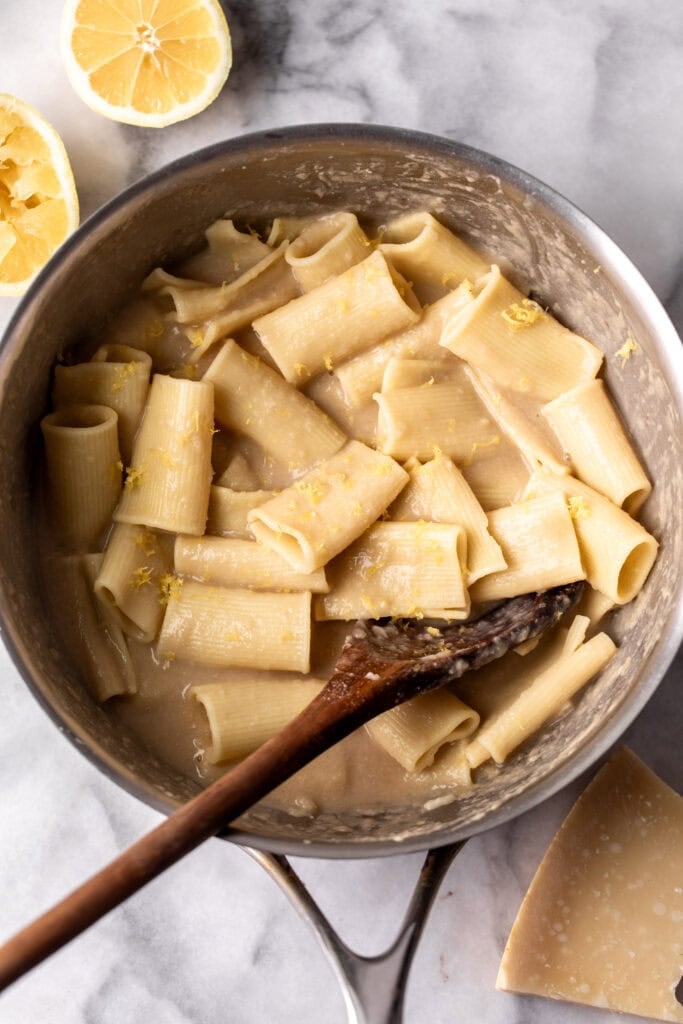 Simple creamy white bean and lemon pasta made with Paccheri noodles.
