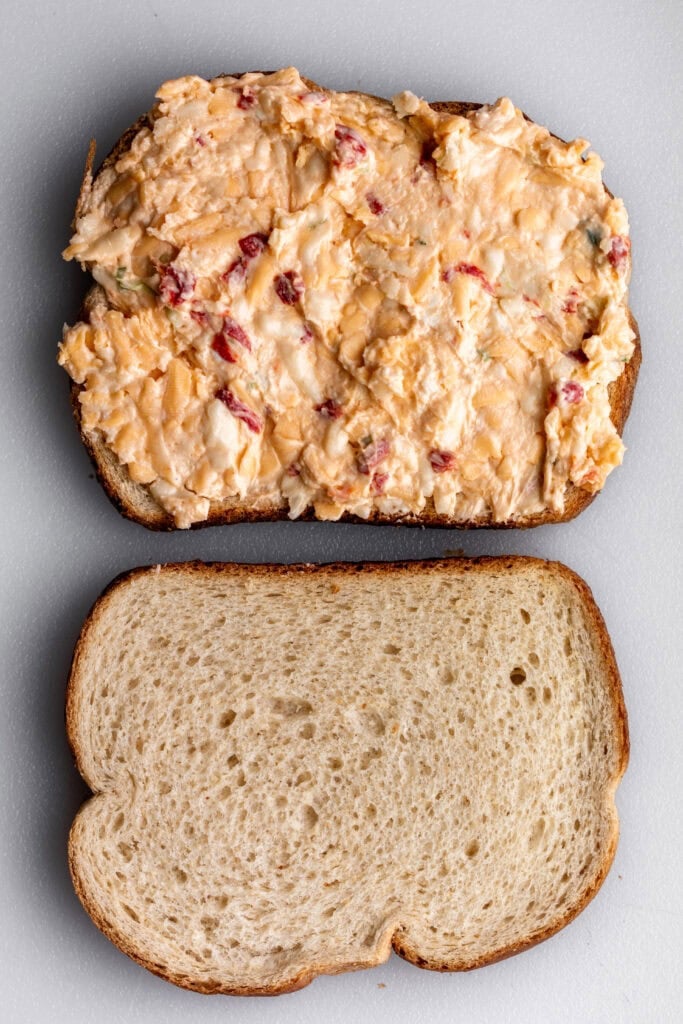 Southern Pimento Cheese Sandwich spread on white bread.