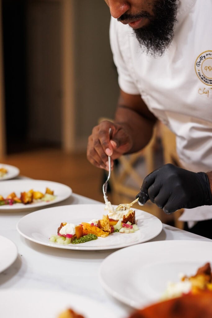 chef plating dinner plate.