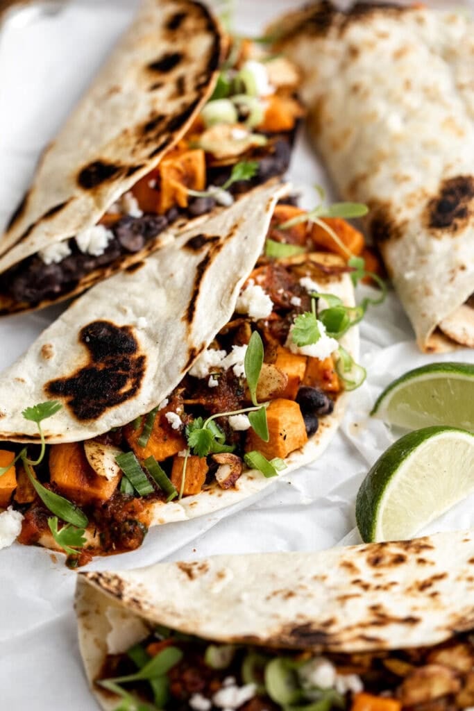 sweet potato and black beans tacos with chili lime almonds. 