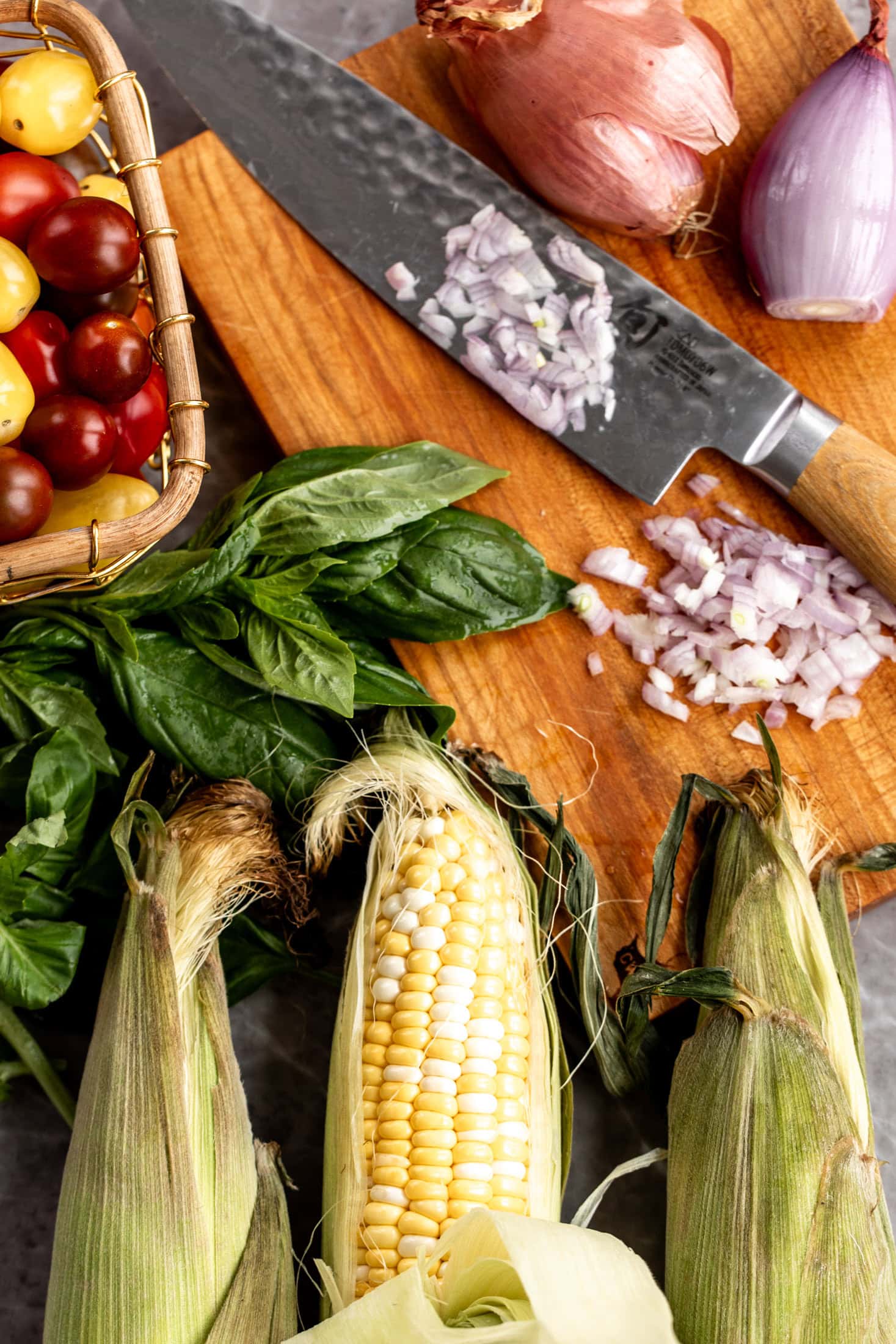 roasted cod with tomato and corn ingredients.