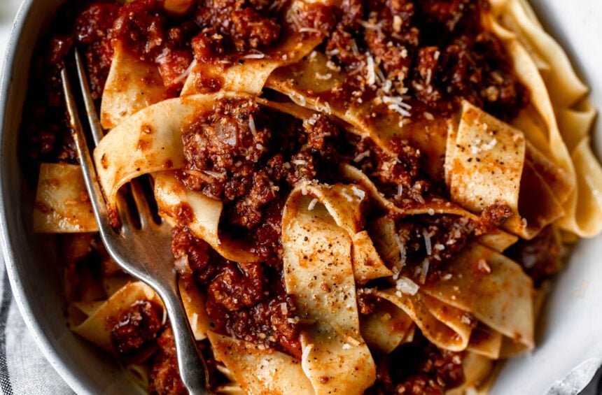 slow simmered 4-ingredient bolognese over papardelle pasta.