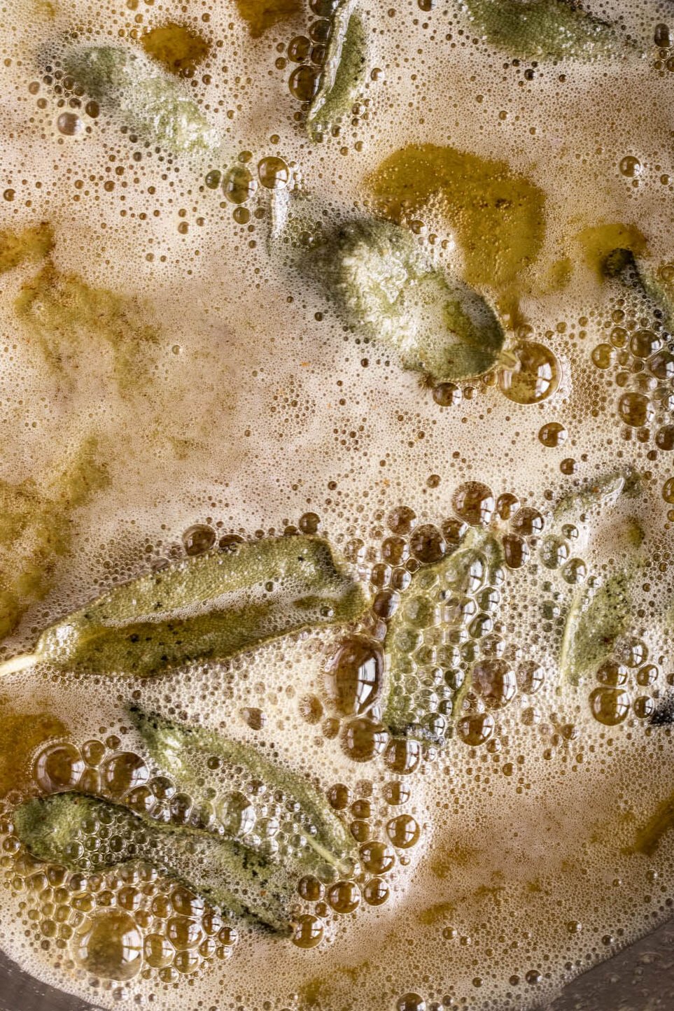 fried sage in butter in pan.