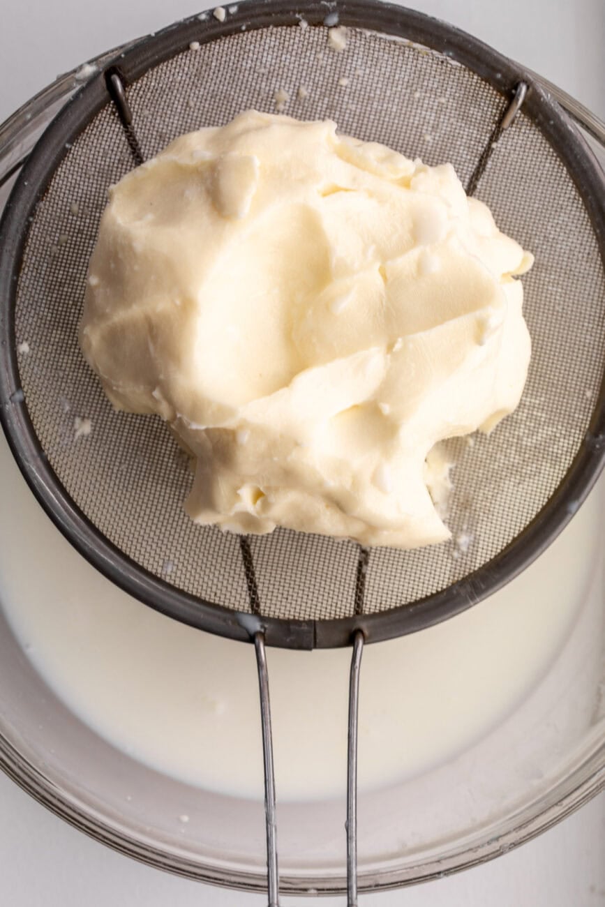 stained butter separated from buttermilk.
