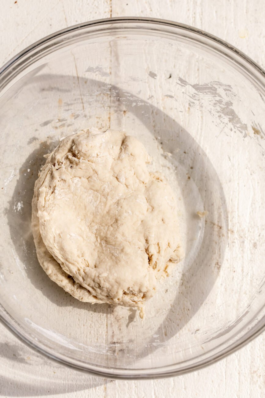 combined pizza dough in bowl.