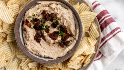 sweet onion dip with caramelized onions and potato chips.