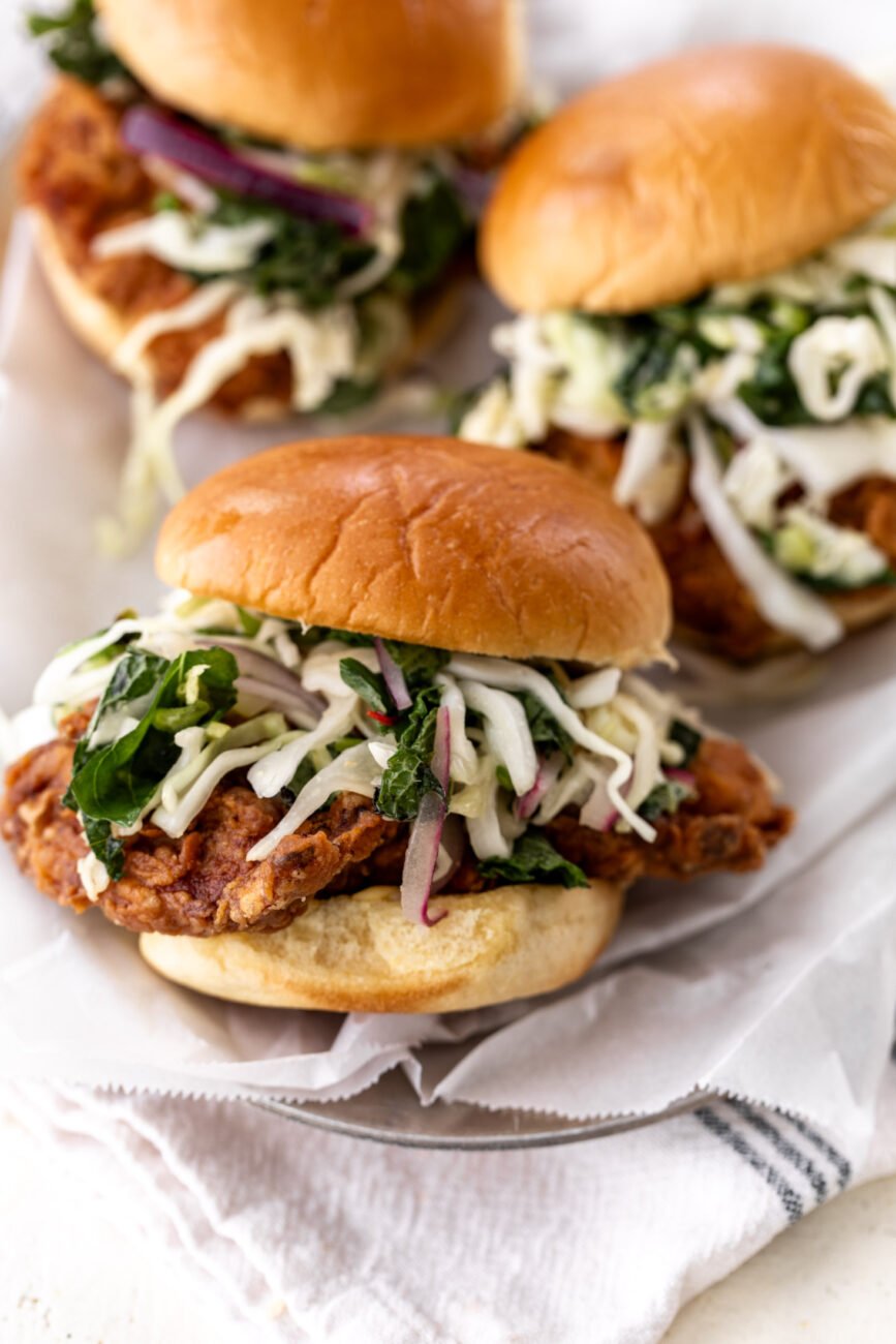tangy thai fried chicken sandwich with slaw.