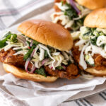 tangy thai fried chicken sandwich with slaw.
