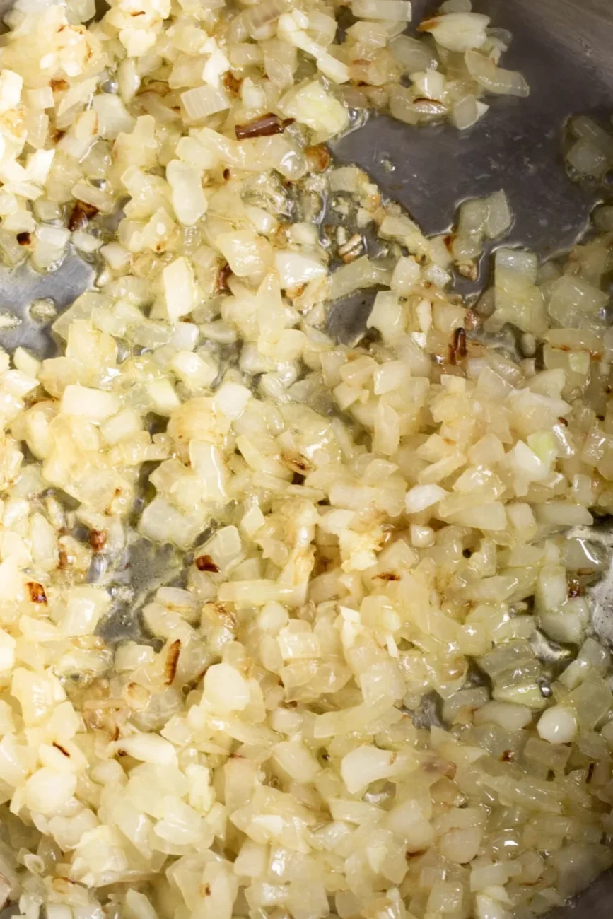 sautéed onion in pan.