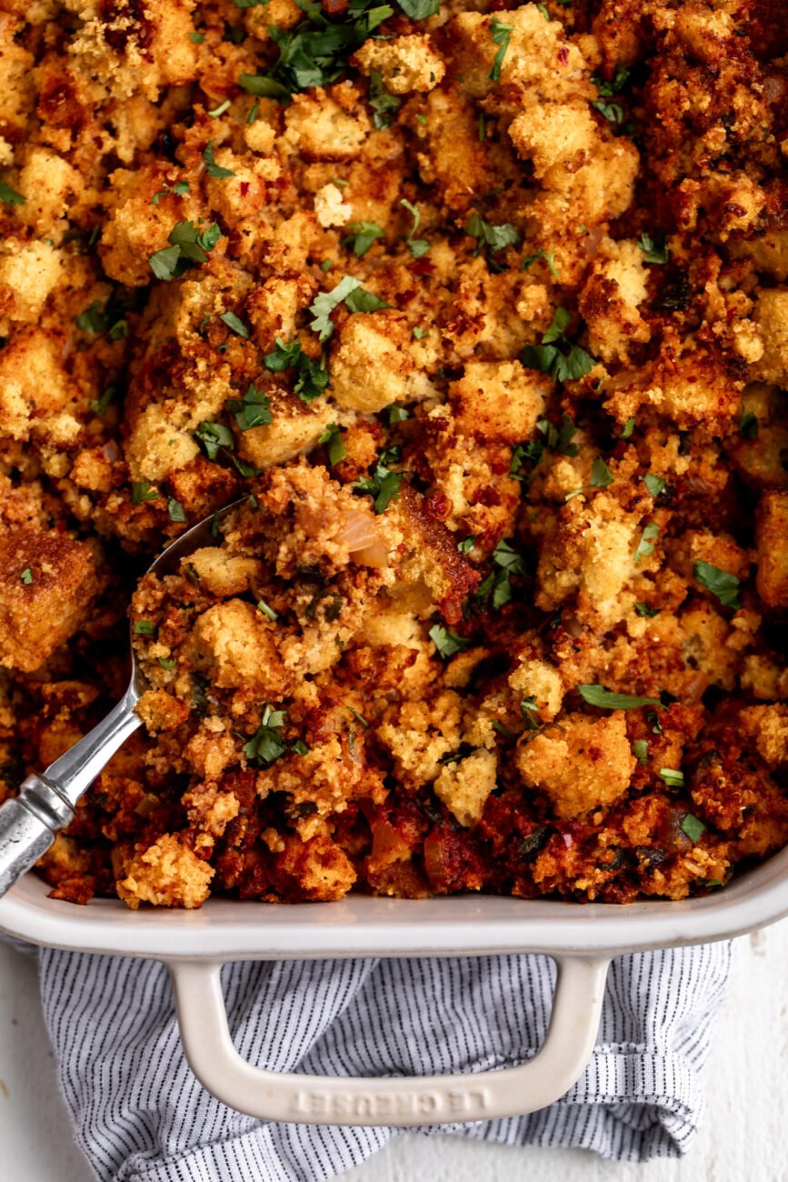 chorizo cornbread stuffing garnished with cilantro.