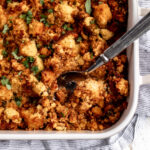 Chorizo cornbread stuffing in baking dish.