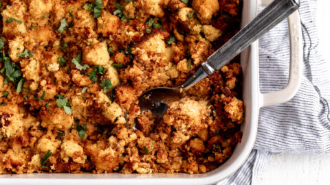 Chorizo cornbread stuffing in baking dish.