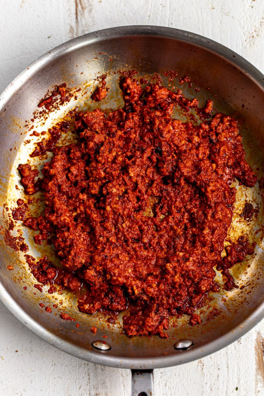 sautéed chorizo in pan.