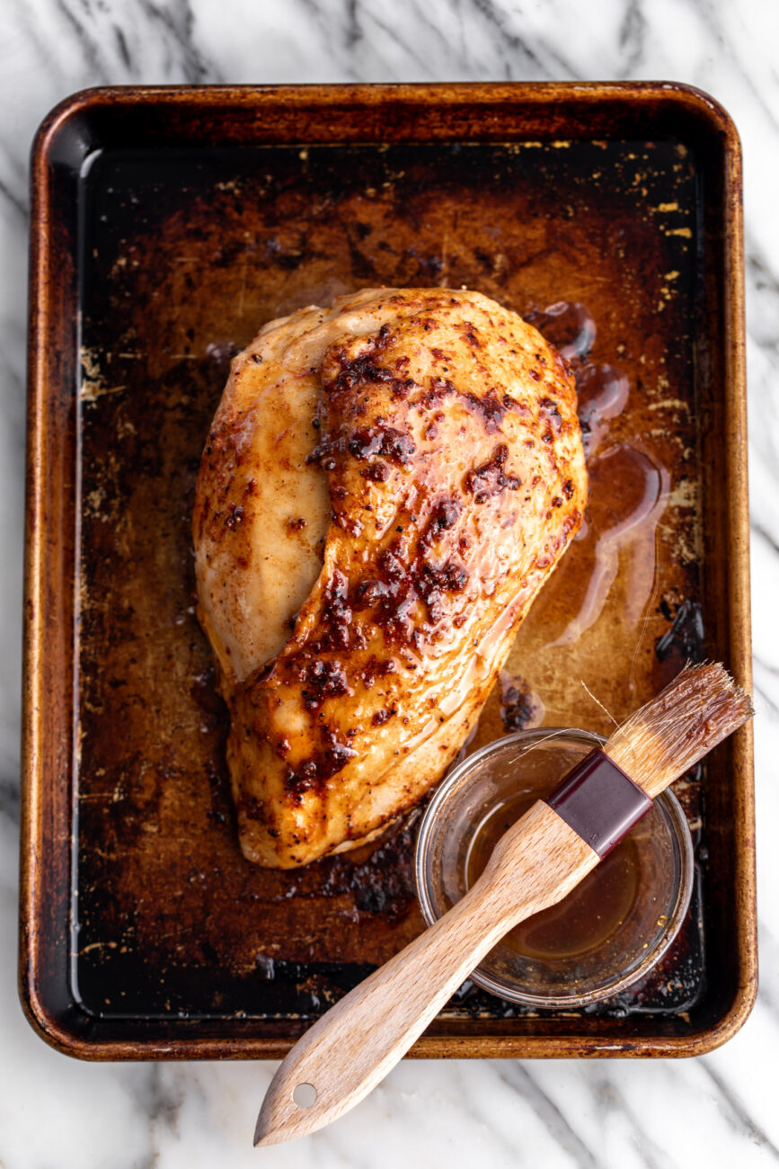 maple bourbon glazed turkey brushed on turkey breast.