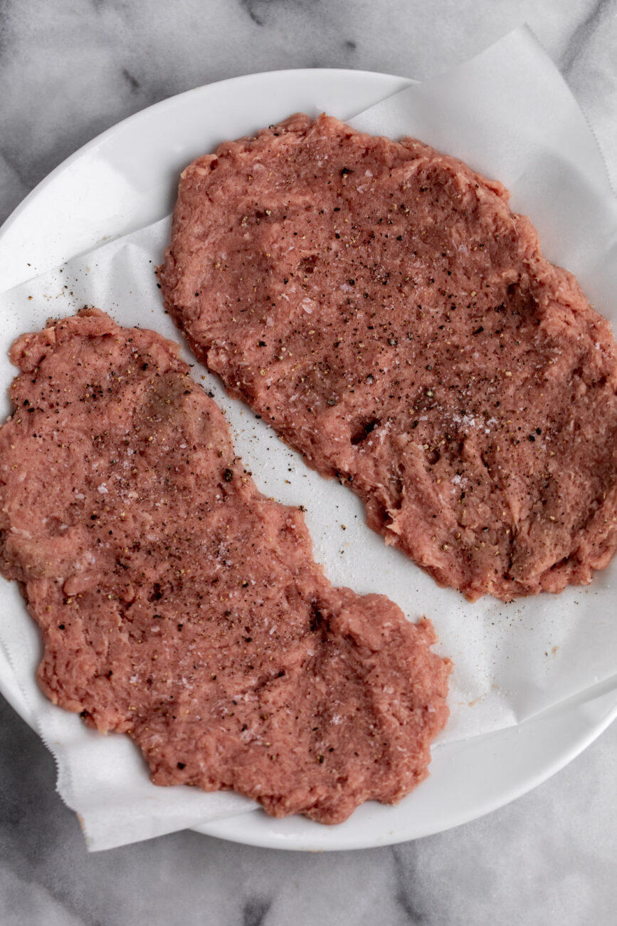 shaped turkey patties seasoned with salt and pepper.