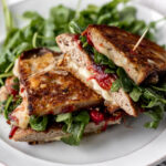 Turkey Melt with Cranberry Onion Jam on plate.