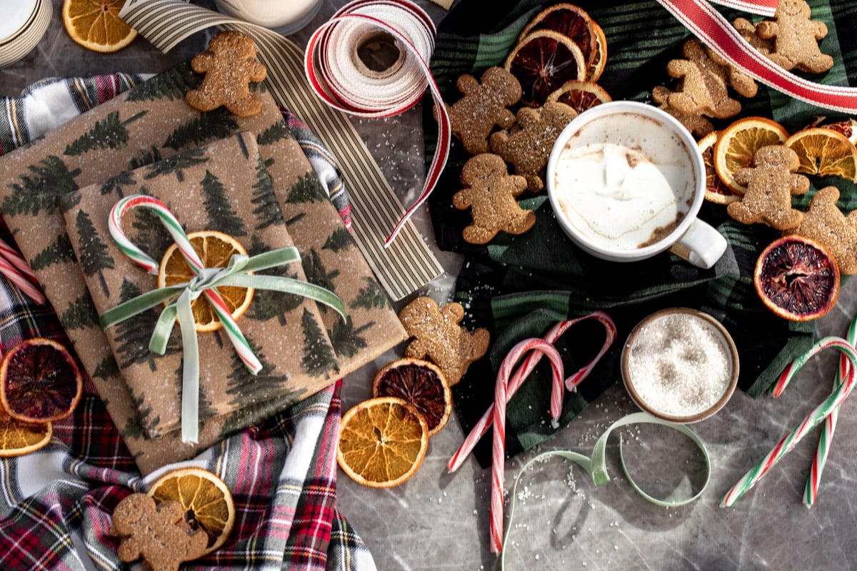 CWCR Holiday Gift Guide 2024 wrapped presents and gingerbread men.