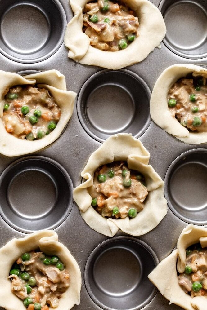 how to fill Mini Chicken & Prosciutto Pot Pies in muffin tins.