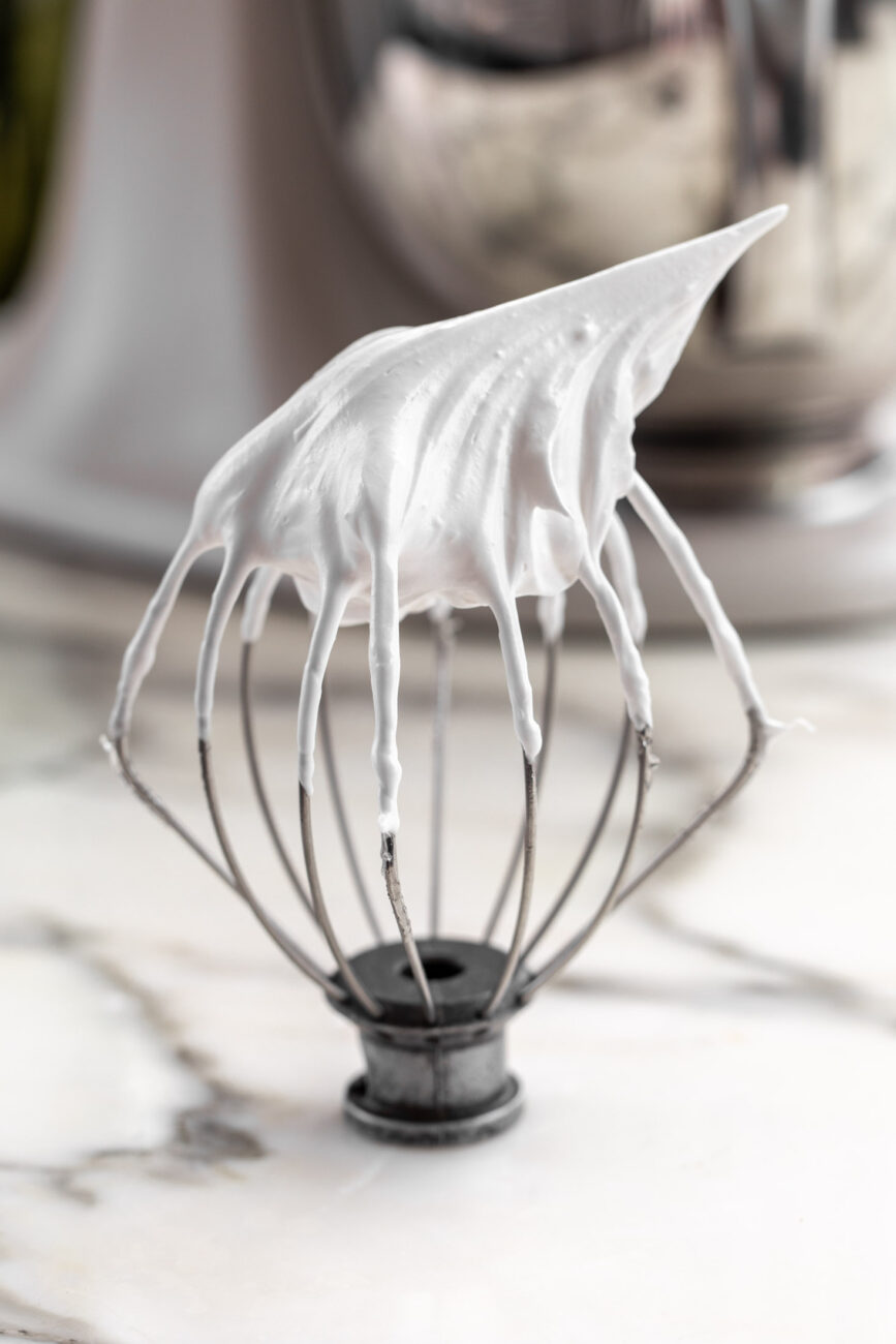 firm whipped Italian meringue on stand mixer whisk. 