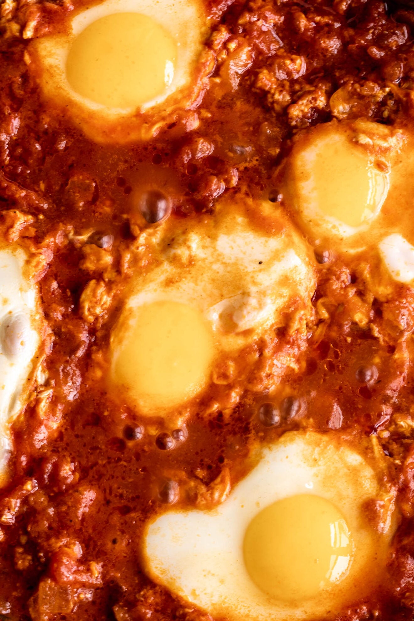 how to make shakshuka recipe spicy baked eggs.