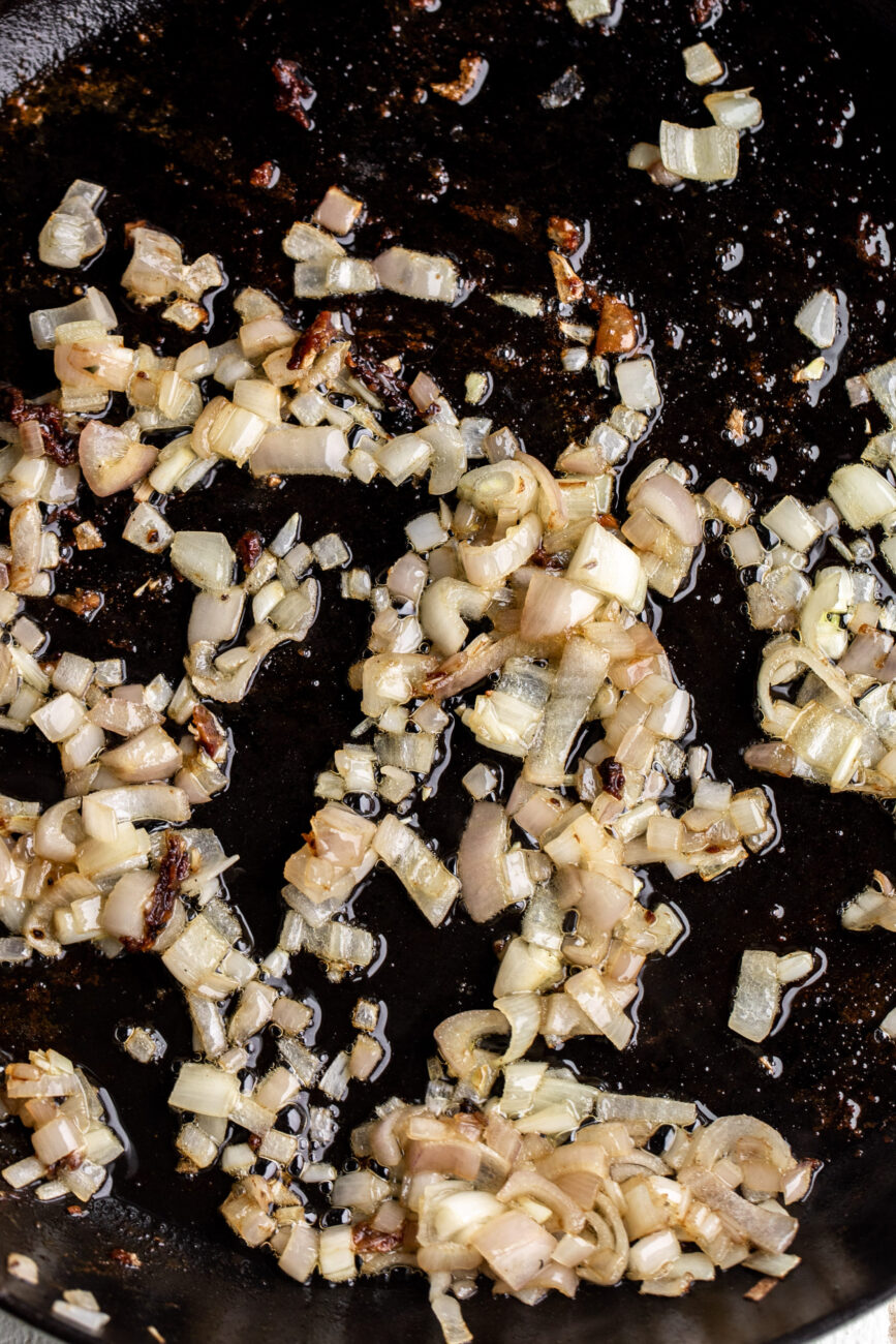 Spinach and Artichoke Chicken and Orzo Bake - Step 2: Sauté shallots.