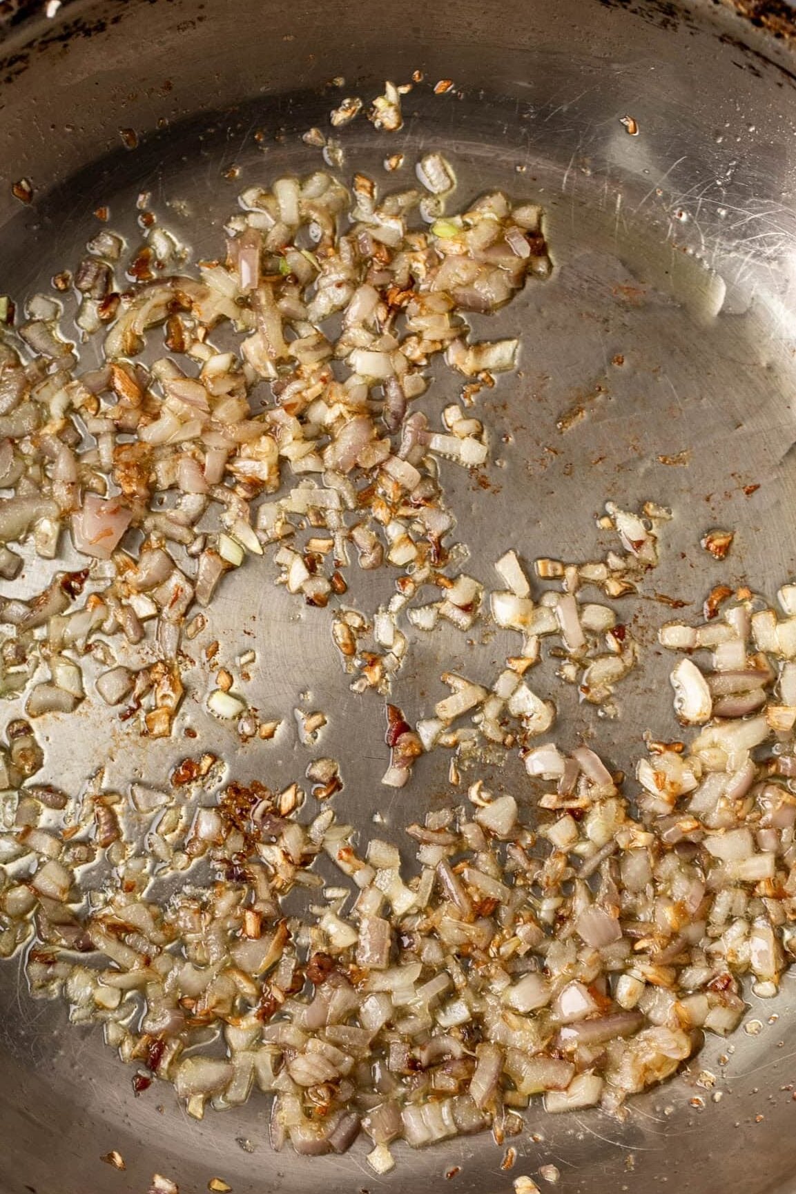Sauté shallots in sauté pan.