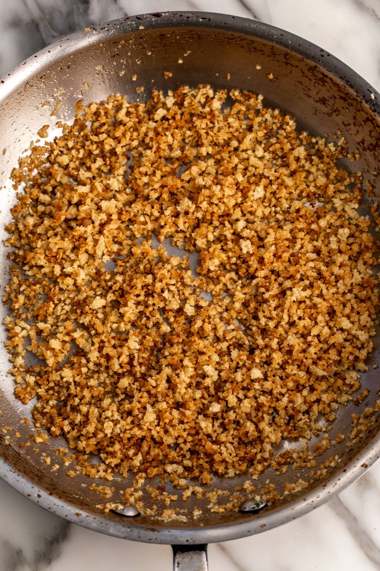 crispy buttered panko breadcrumbs in pan.