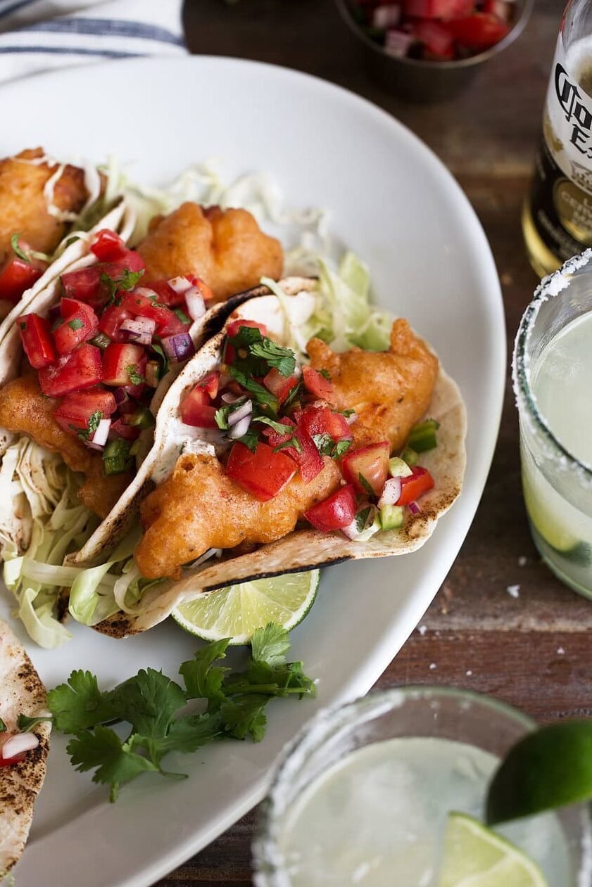 Beer battered baja fish tacos with herb yogurt sauce.