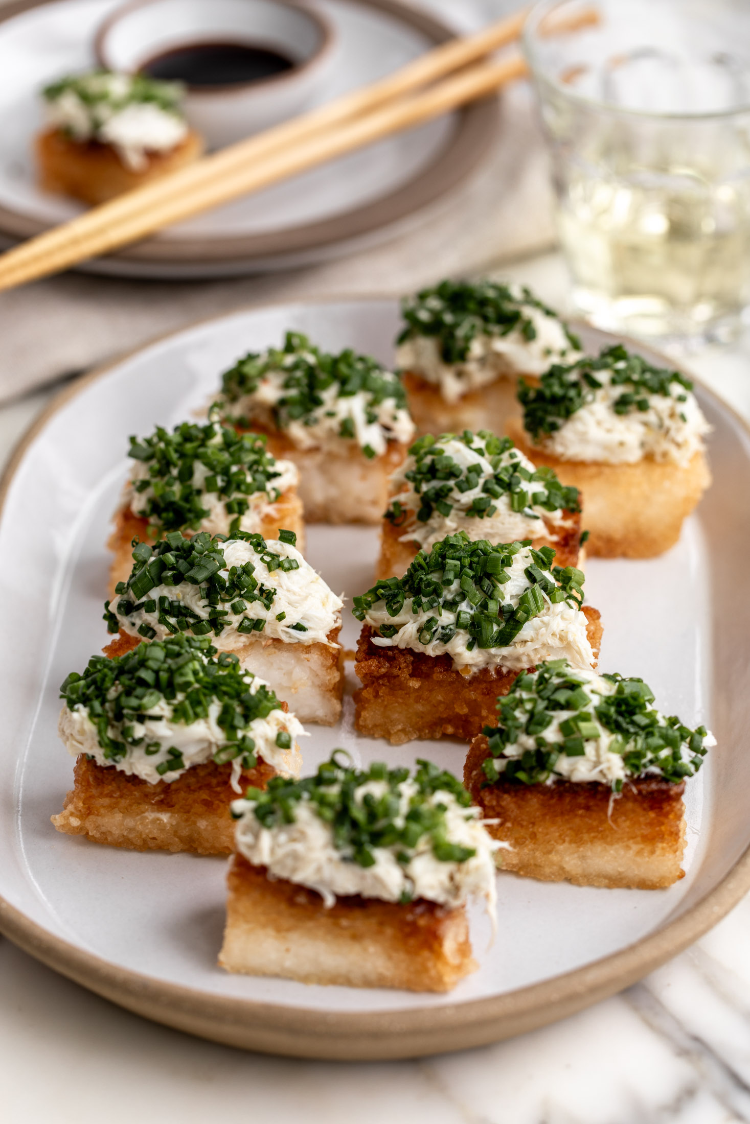 crispy rice with spicy crab topping made with yuzu kosho and diced chives.