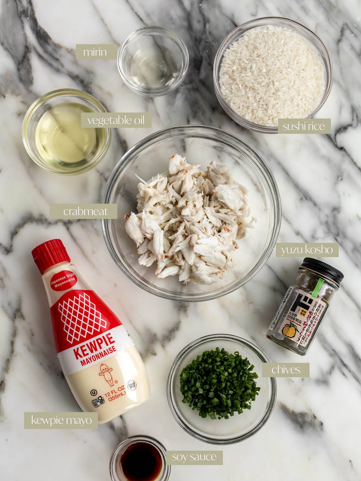 spicy crab crispy rice with yuzu kosho labeled ingredient flatlay.