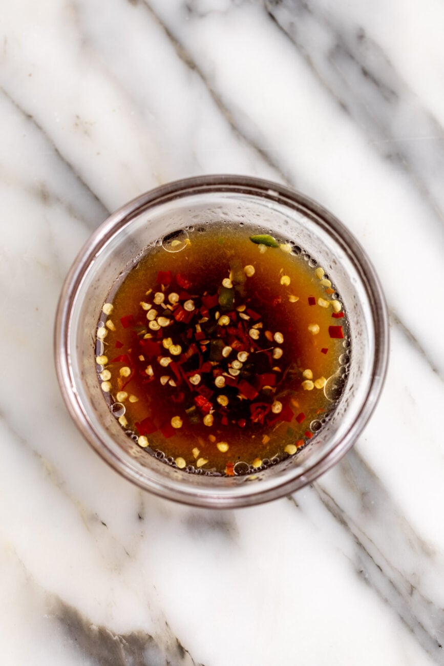 fish sauce and lime juice dressing with thai chilies.