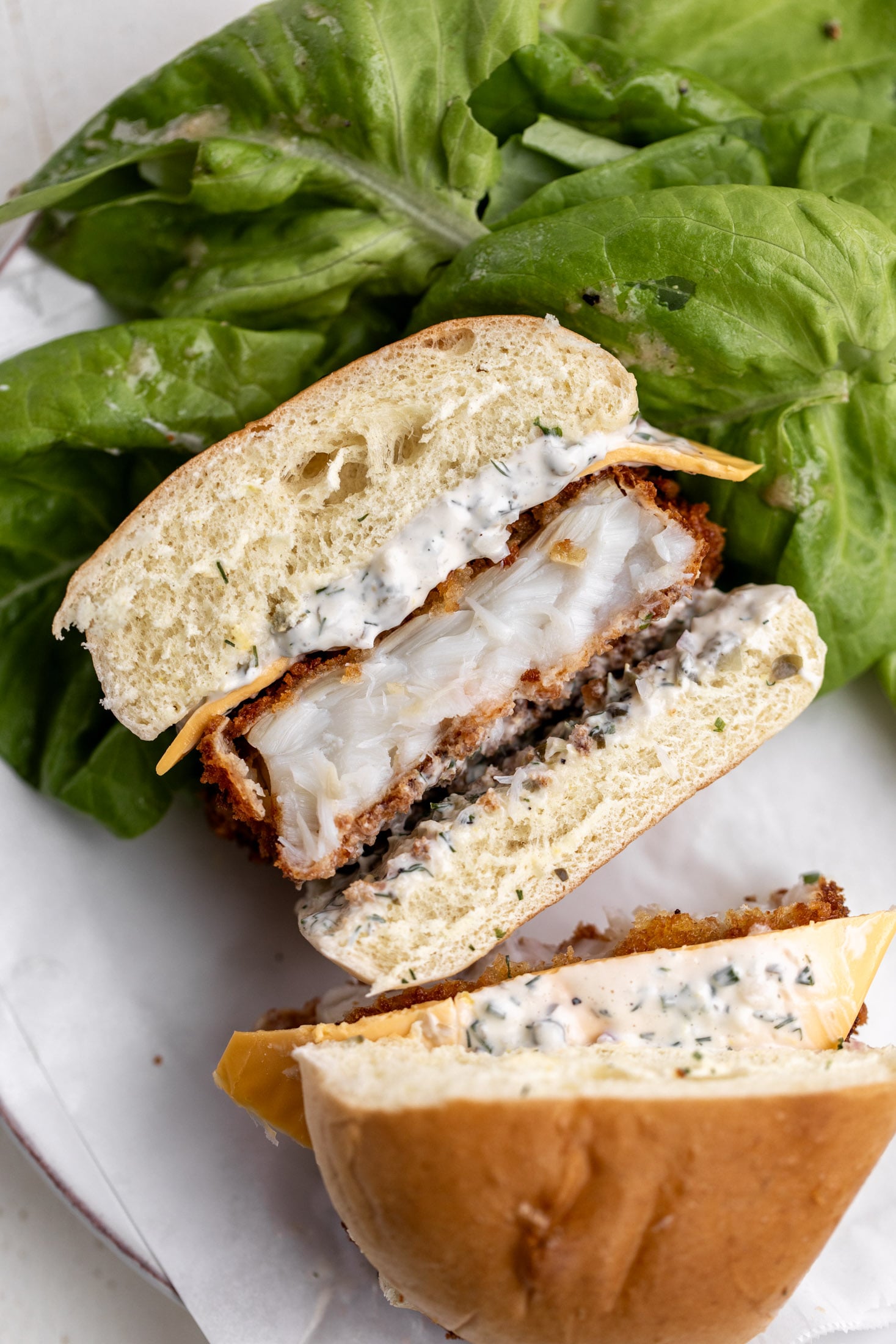 cross section of homemade filet-o-fish sandwich.