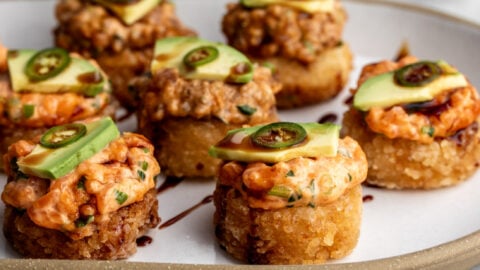 how to make crispy rice the nobu method topped with spicy tuna and salmon with avocado.