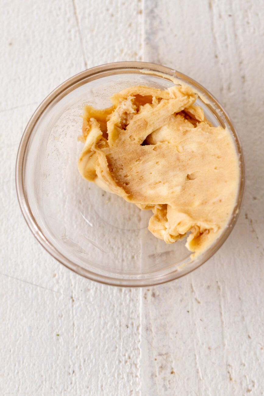 miso butter combined in glass mixing bowl.